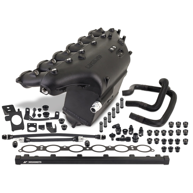 Cast-aluminum end tanks and included billet fuel rail on Mishimoto S58 forced induction manifold