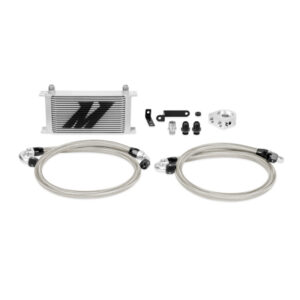 Mishimoto 19-row oil cooler kit installed in the front bumper of a Subaru WRX STI