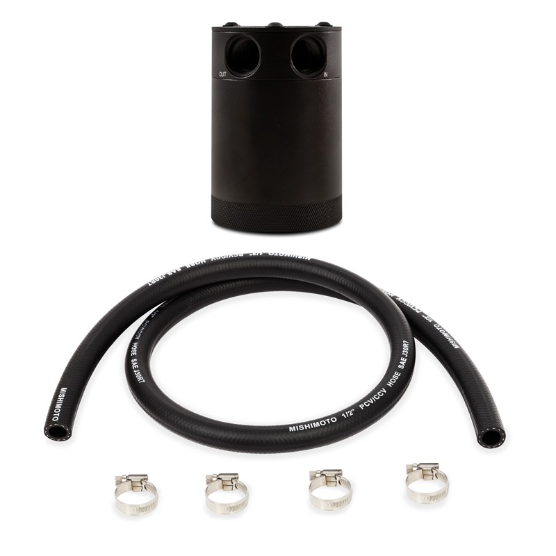Black Mishimoto 2-port oil catch can showing 50 micron bronze filter and internal baffle design