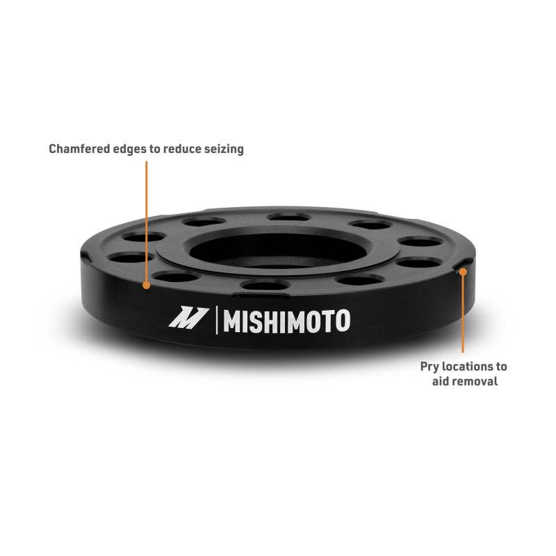 Black Mishimoto wheel spacer showing 15mm thickness and 5x112 bolt pattern design