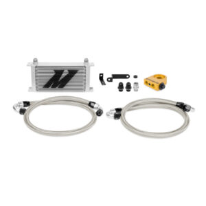 Mishimoto 19-row oil cooler kit mounted in the front bumper of a 2008-2014 Subaru WRX STI
