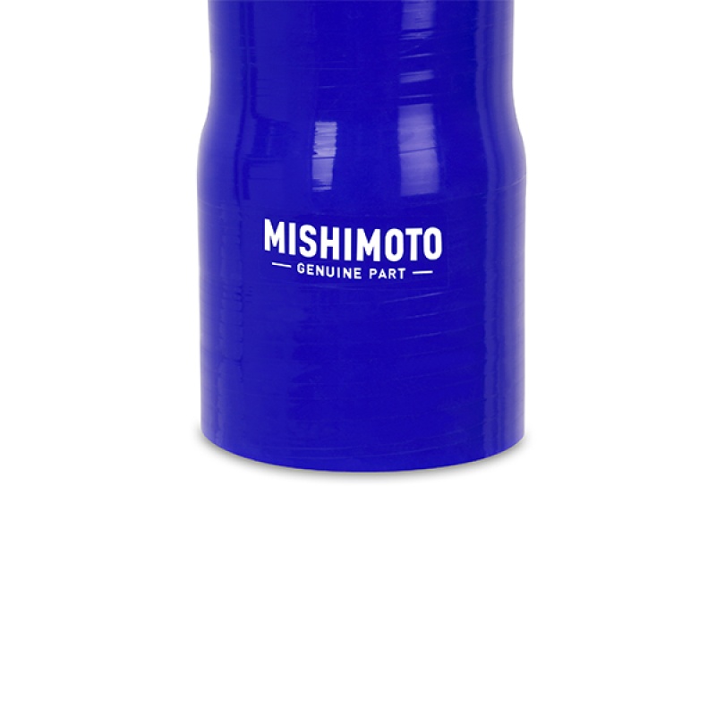 Blue Mishimoto silicone coolant hoses replacing factory rubber Cummins hoses