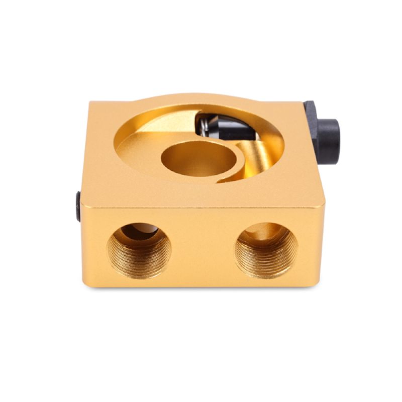 Compact Mishimoto oil sandwich plate designed for tight engine bay clearance