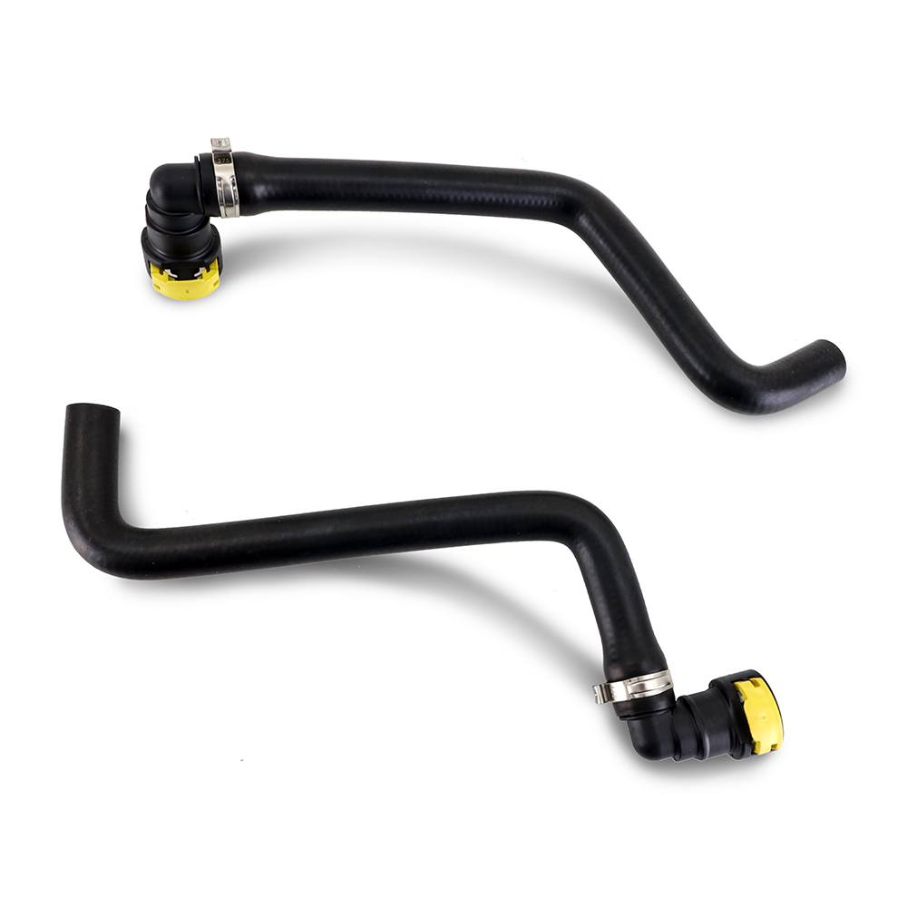 Mishimoto oil catch can kit installed with Ford-specific quick-disconnect hose fittings