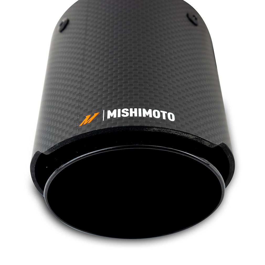 Close-up of satin finish carbon fiber shroud on Mishimoto exhaust tip