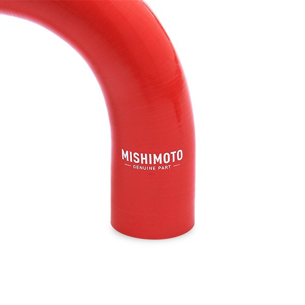Close-up of Mishimoto red silicone coolant hose showing 4-ply silicone construction