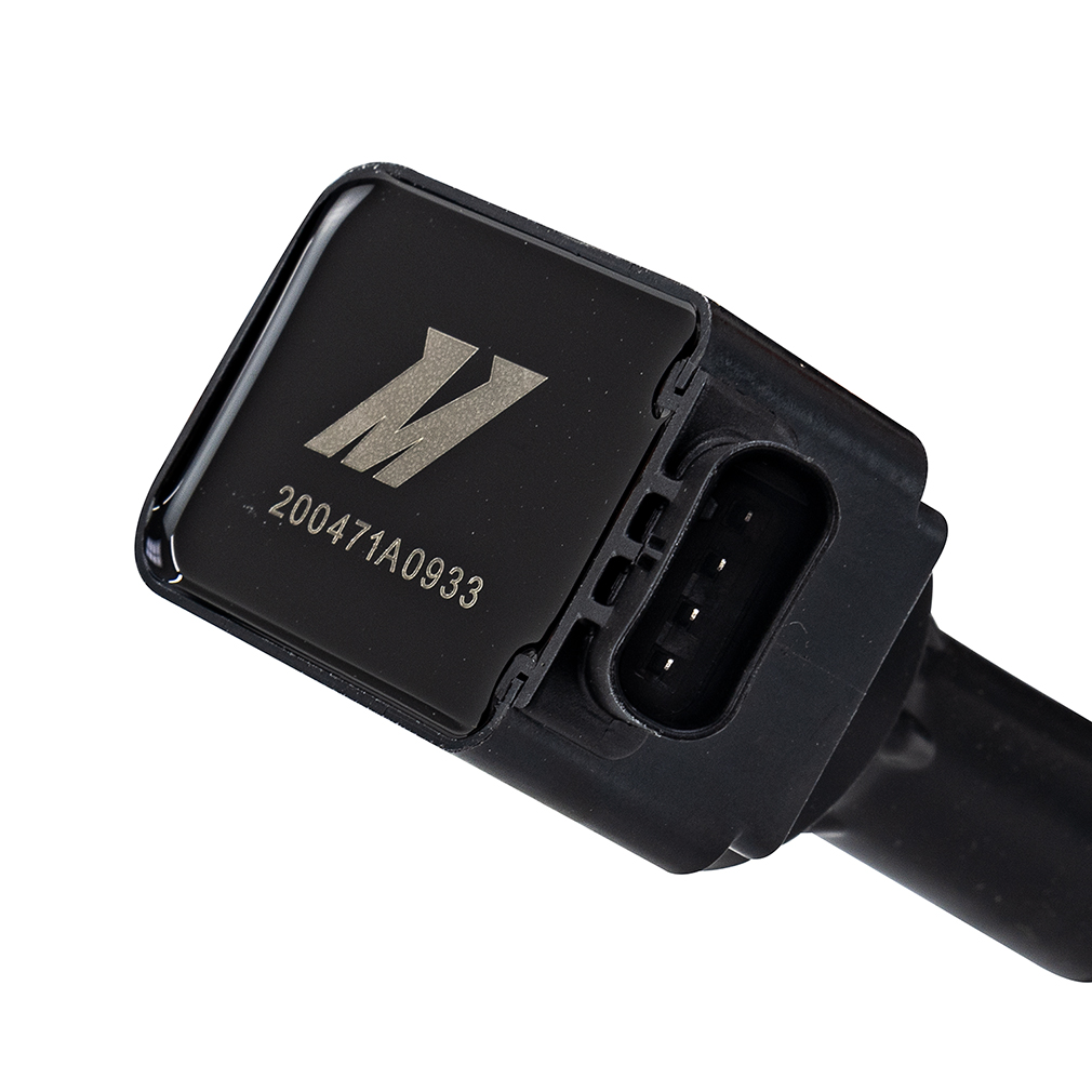 Mishimoto ignition coil shown next to spark plug for Hyundai Elantra N and Kona N
