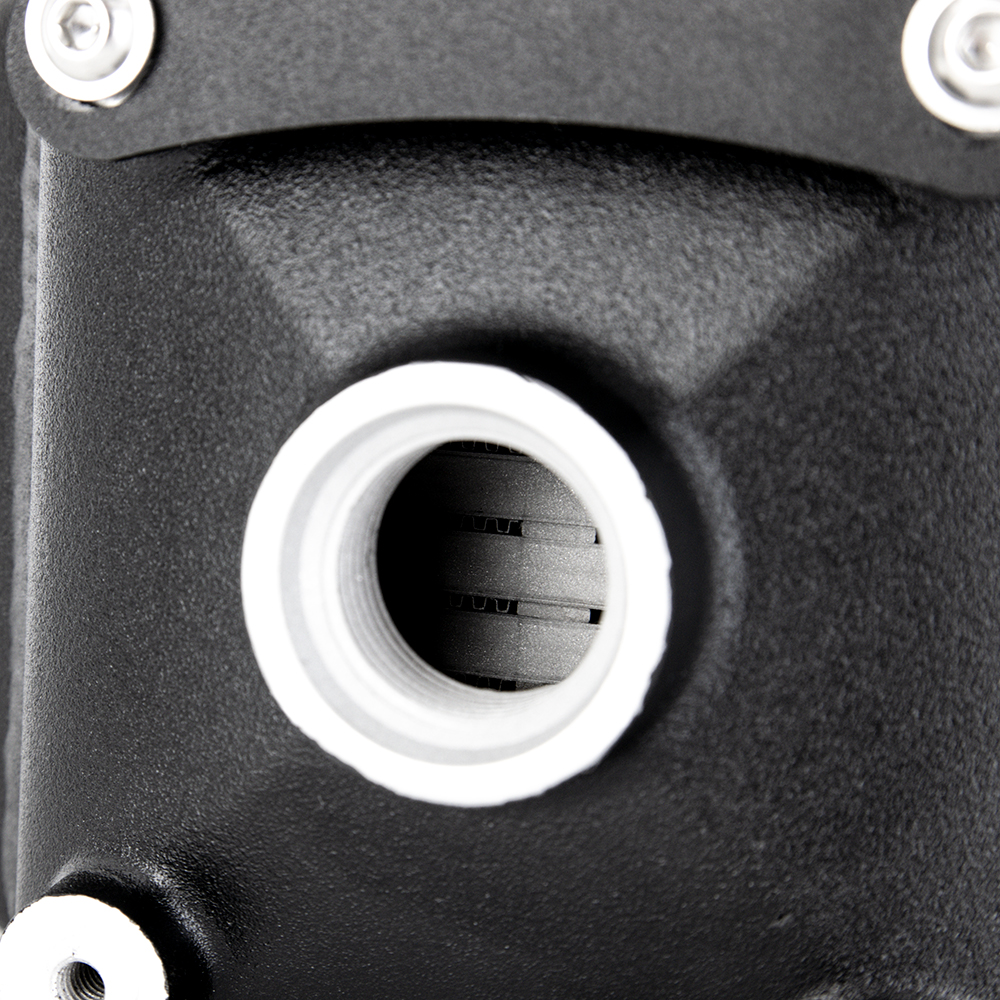 CNC-machined ribbed inlet and outlet couplers on Mishimoto forced induction intercooler
