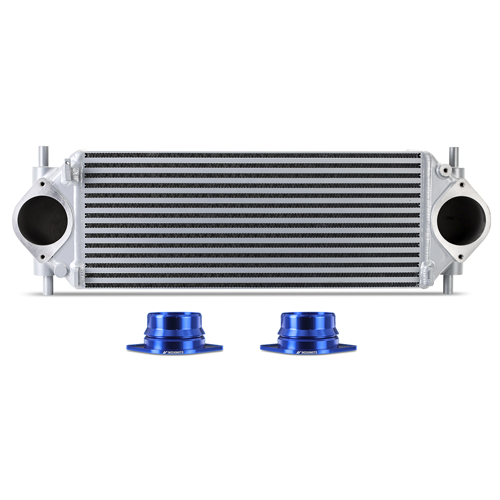 Silver Mishimoto intercooler core with cast aluminum end tanks and CNC-machined 6061 aluminum flanges