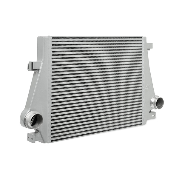 Mishimoto performance intercooler with CNC-machined quick-disconnect fittings for stock intercooler pipes