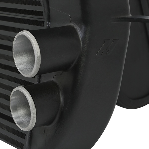Mishimoto intercooler and pipe kit installed behind front bumper of Ford F-150 EcoBoost