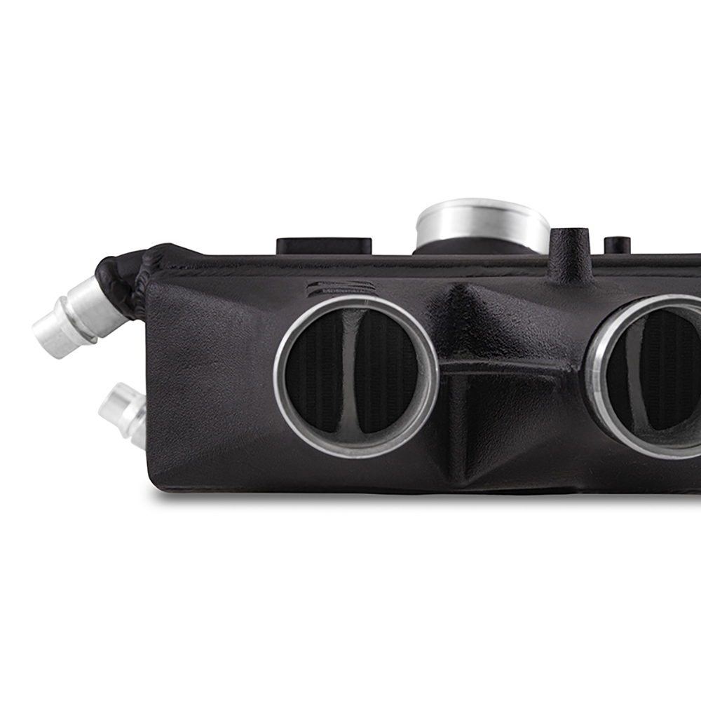 Mishimoto performance intercooler installed in the engine bay of a BMW F80 M3