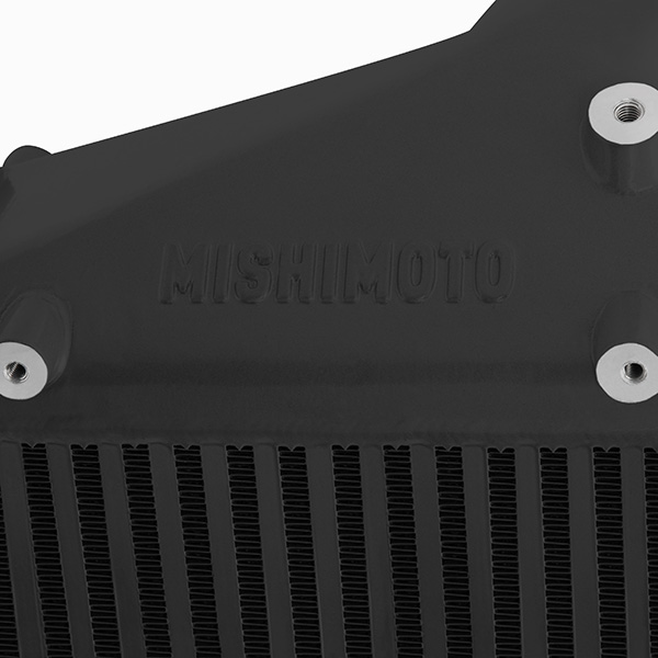 Mishimoto intercooler larger-than-factory outlets for increased forced induction flow
