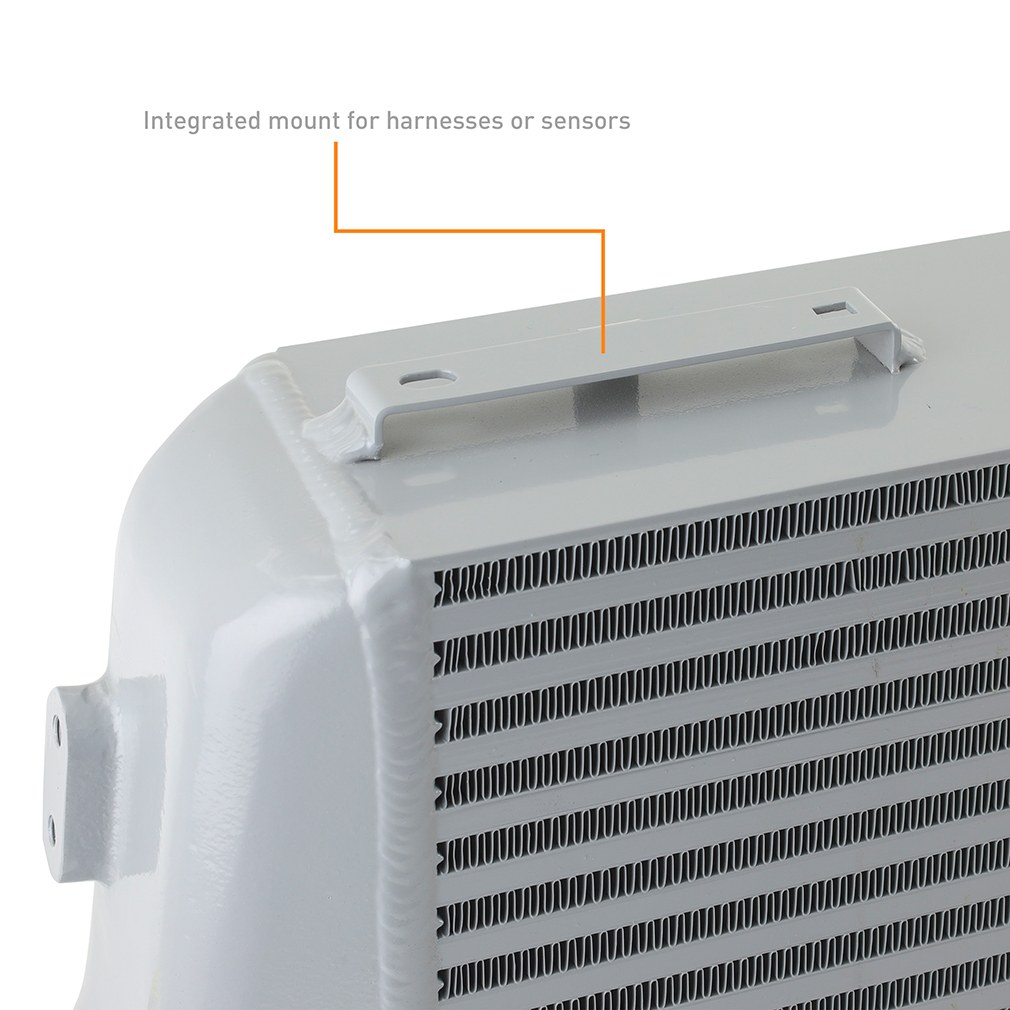 Silver powder-coated Mishimoto bar-and-plate intercooler core for forced induction builds