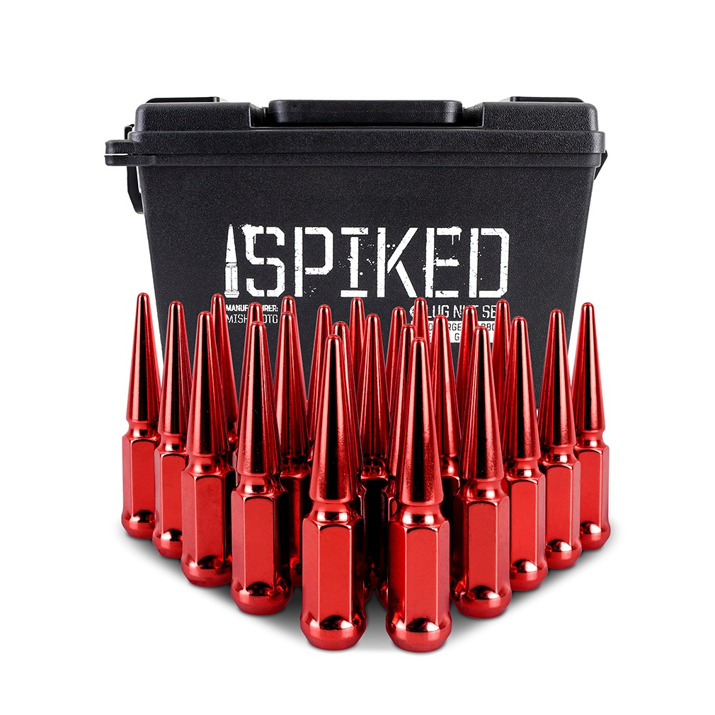 Close-up of Mishimoto electroplated red spiked lug nut finish on wheel