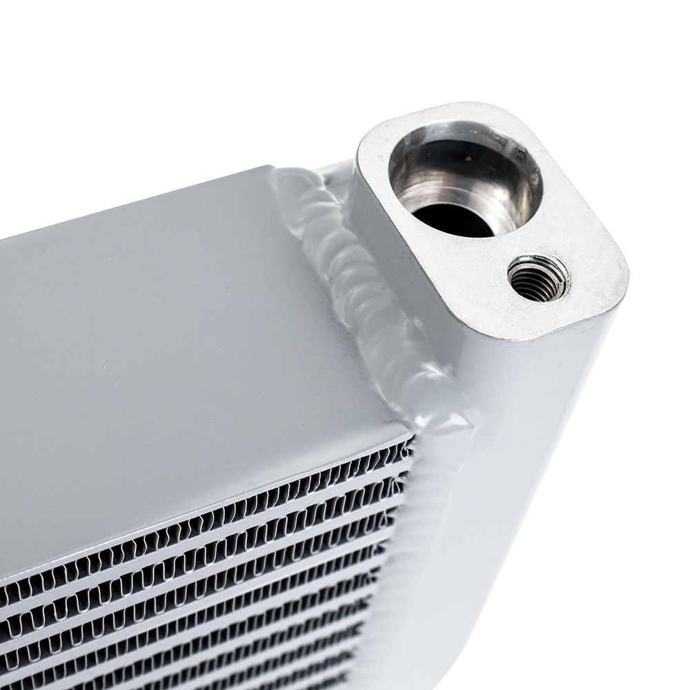 Mishimoto silver powder-coated oil cooler installed for BMW M5, M6, M8, and M850i S63 applications