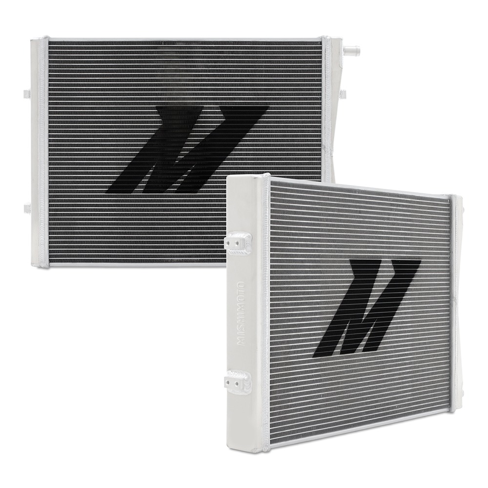 Mishimoto air-to-water heat exchanger showing top right inlet and bottom right outlet locations