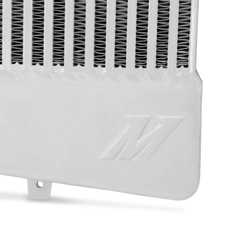 Aluminum Mishimoto M logo badge included with the 6.4L Powerstroke intercooler kit