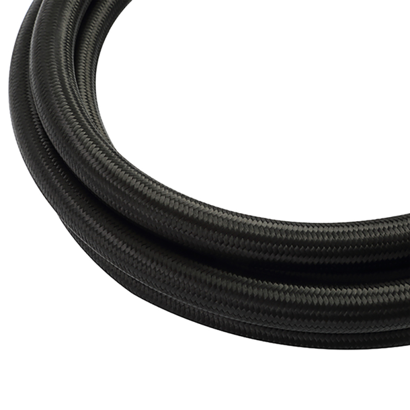 Close-up of Mishimoto black nylon braided line for automotive use