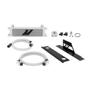 Mishimoto MMOC-WRX-01 silver oil cooler kit mounted in Subaru WRX front grille for airflow