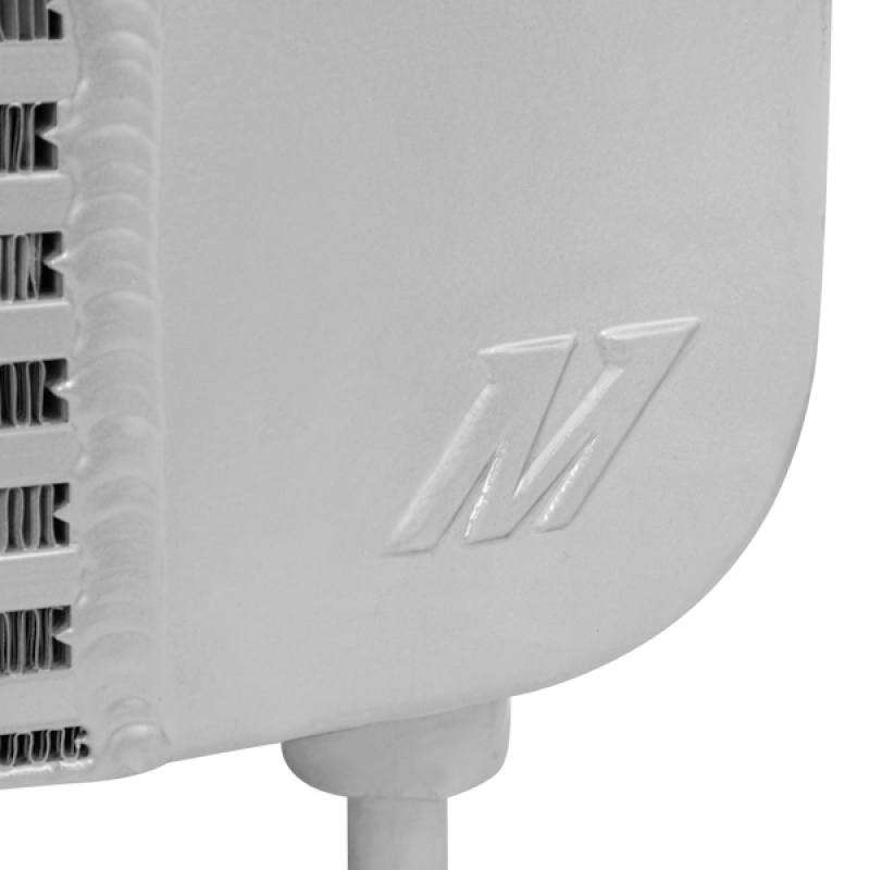 Sleek Silver Mishimoto intercooler core sized for GMC Sierra 3500 6.6L Duramax LB7 trucks