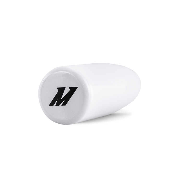 Close-up of Mishimoto white shift knob showcasing ergonomic design