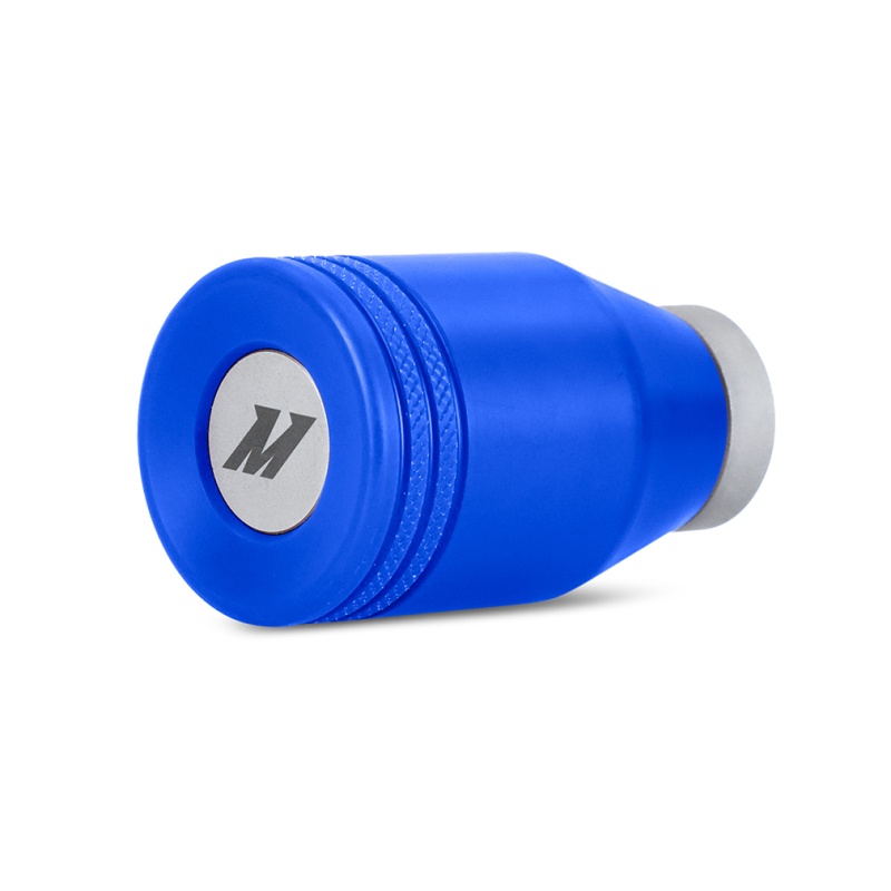 Close-up of Mishimoto shift knob showing silver core and blue finish