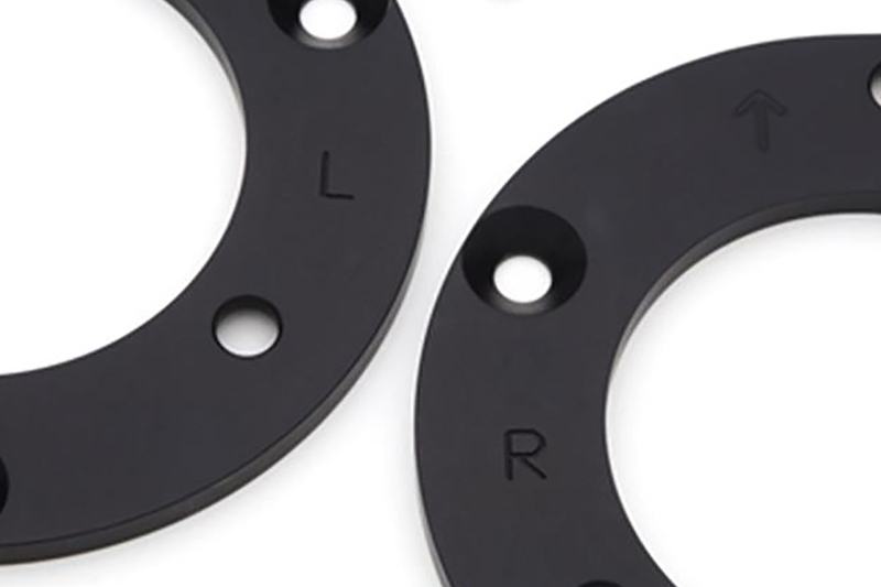 Dinan Camber Plates installed on suspension